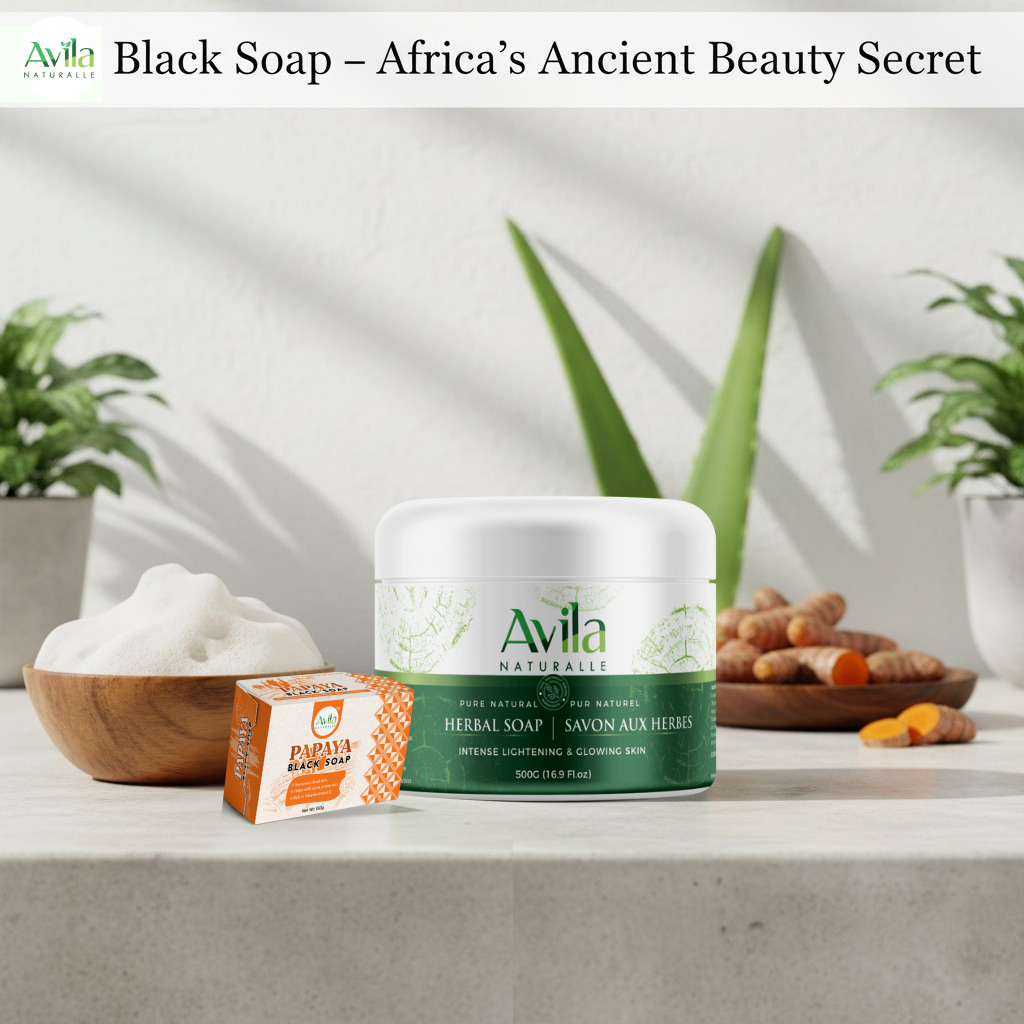 African black soap bars tied with twine resting on palm leaves beside a wooden bowl of foam.